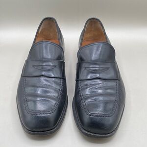 Salvatore Ferragamo Men's Black Leather Slip-Ons (lot 422)